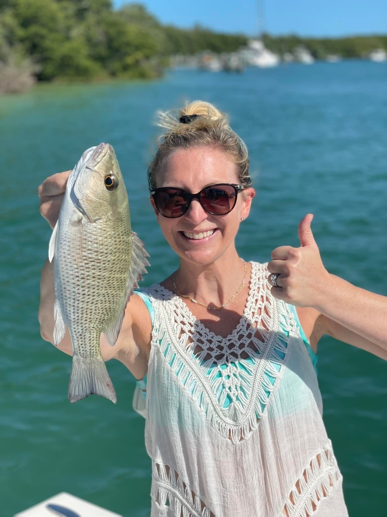 A Grey Snapper, a 13-inch fish, caught in FL