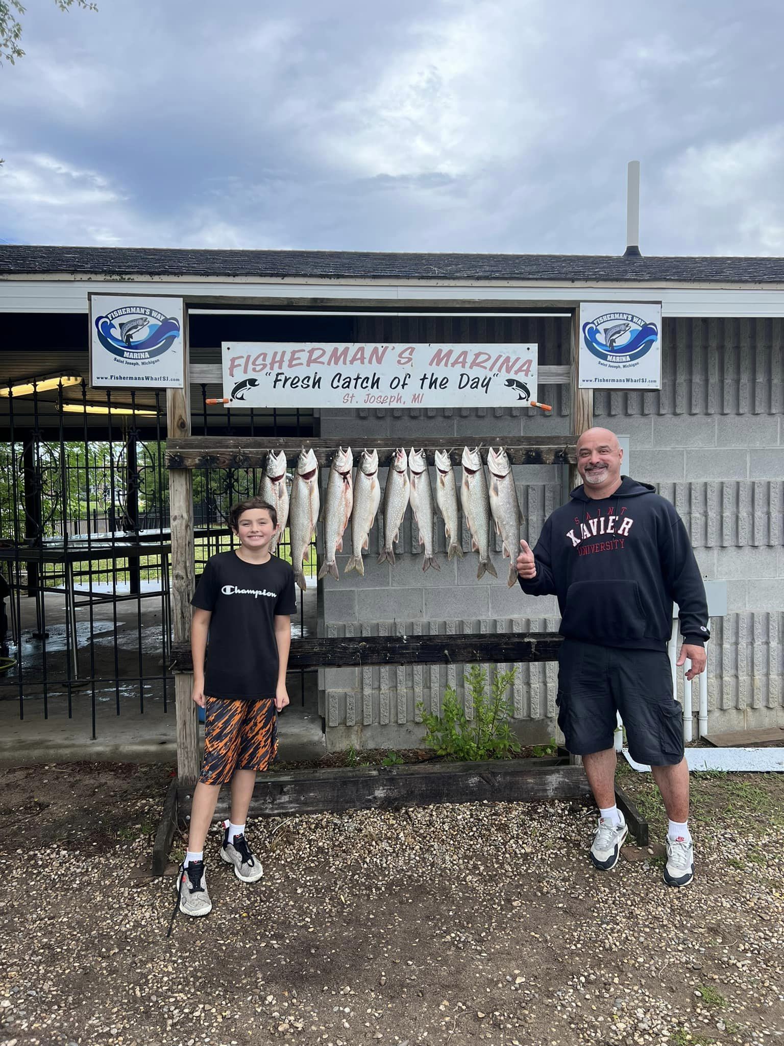Two people fishing in St. Joseph