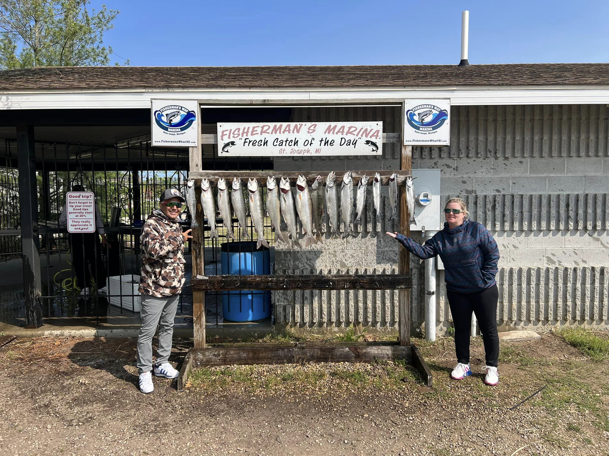 Two people fishing in MI