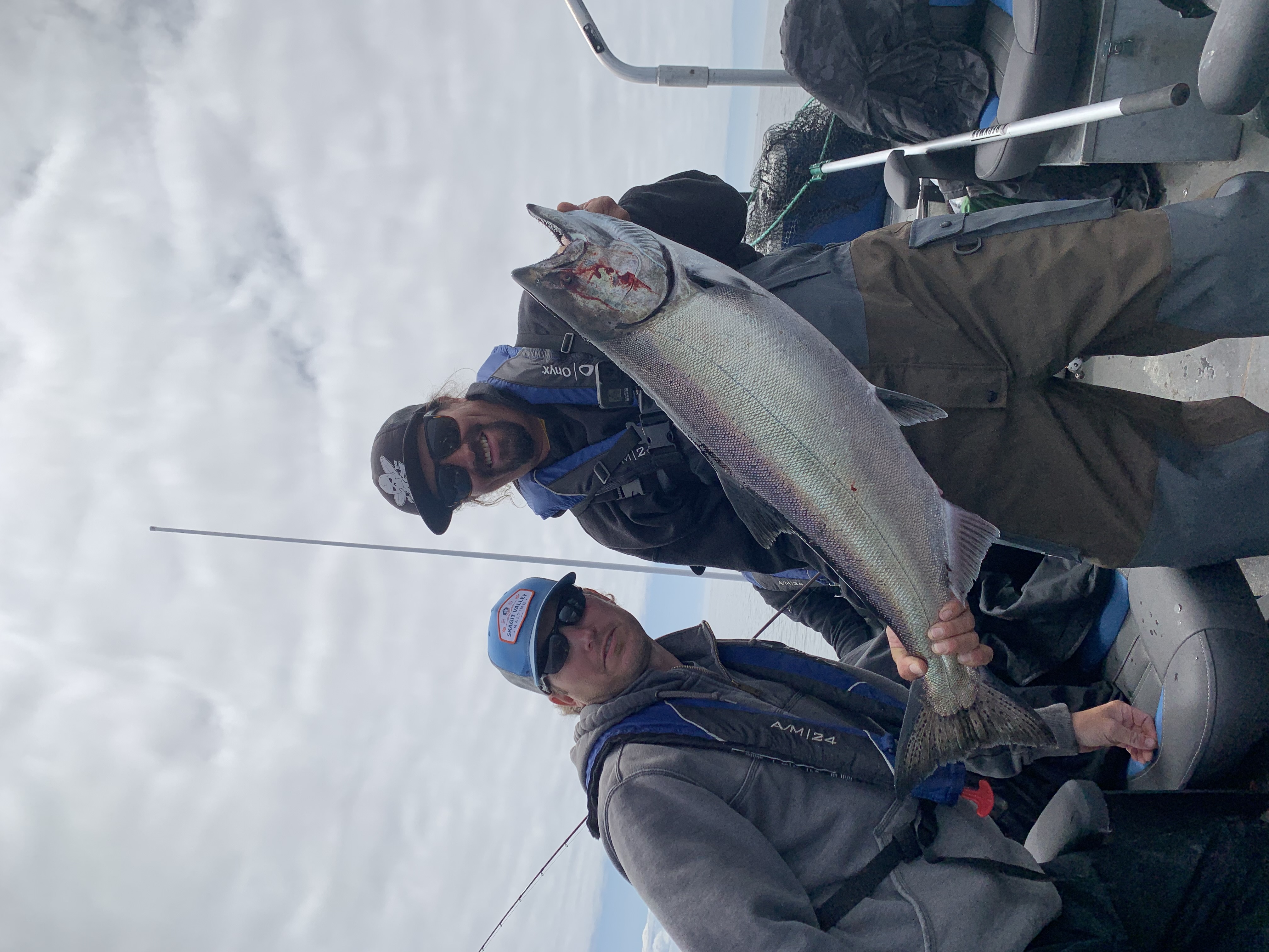 Anglers holding a big fish in Oregon
