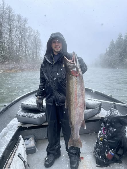 Coho salmon catch displayed on fishing boat in Toledo WA during snowy conditions