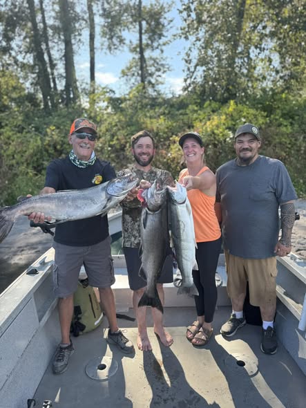 Successful coho salmon fishing trip in Toledo WA with multiple fish caught
