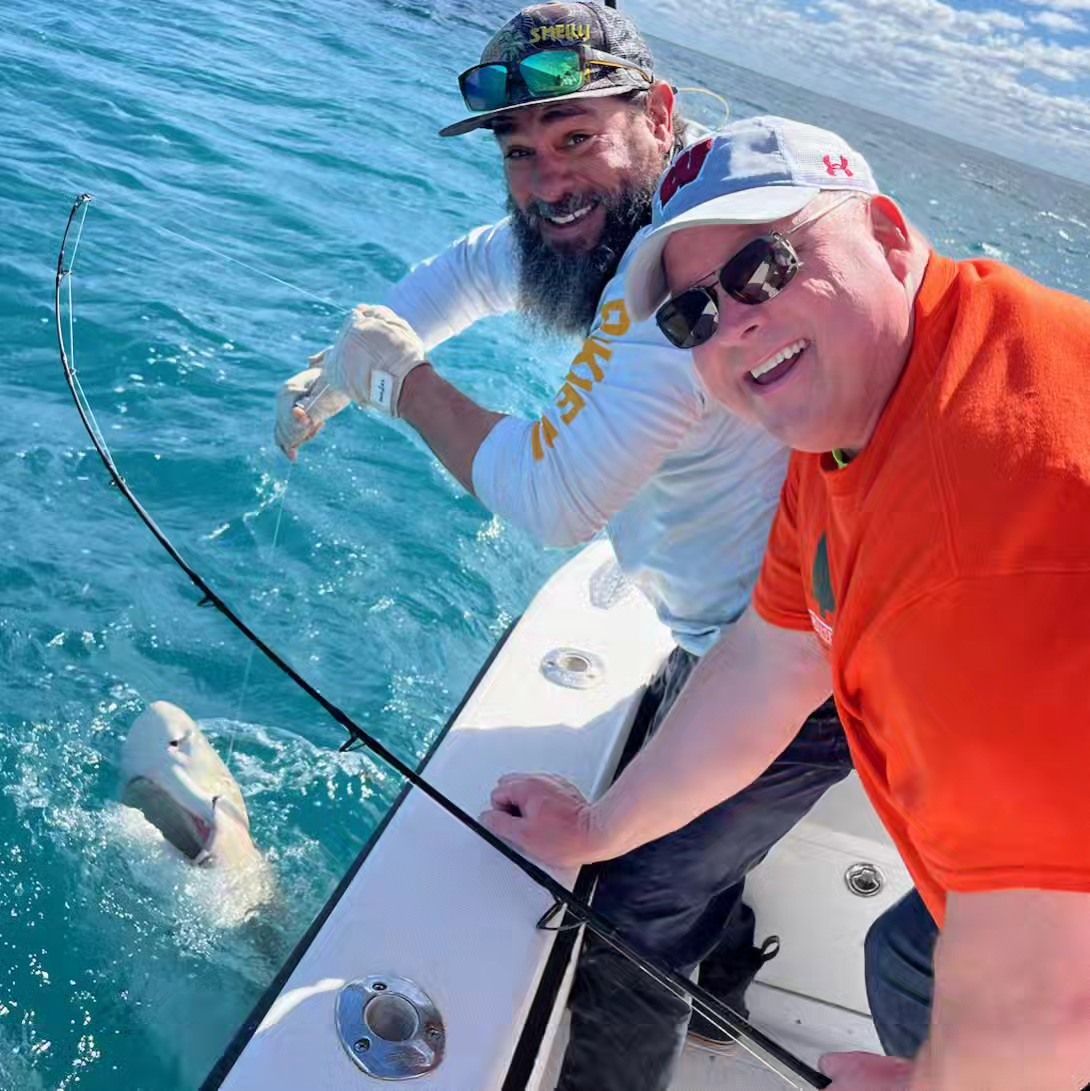 Two people enjoying a fishing tour in Key West