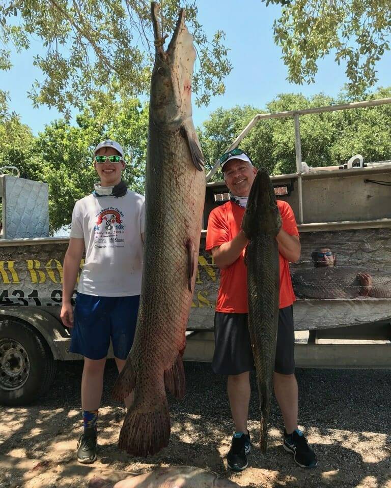 Two anglers posing with their catch in Hockley