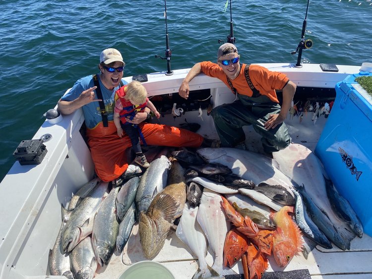 Two anglers with a catch of 2 fish in Alaska