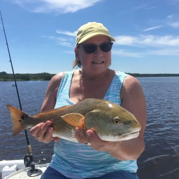 A person fishing in FL