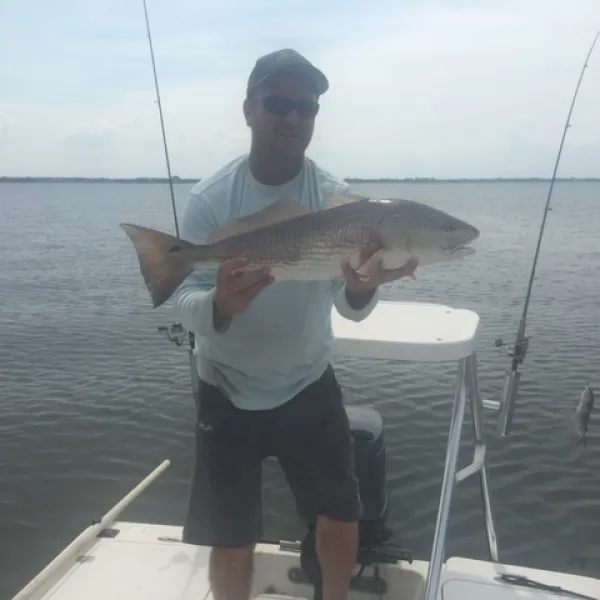Fisherman with a great catch in Palm Coast