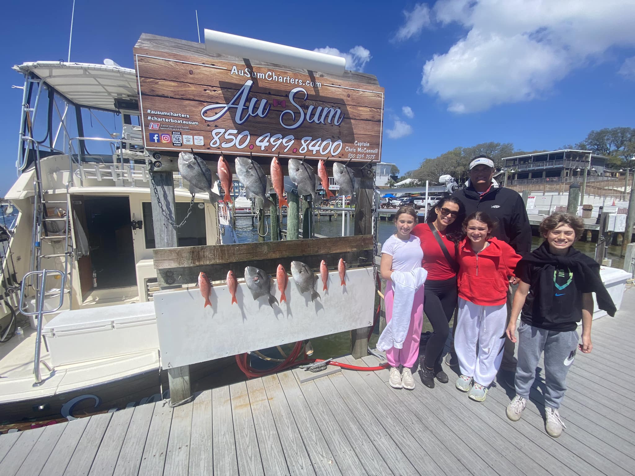 5 people fishing in Destin