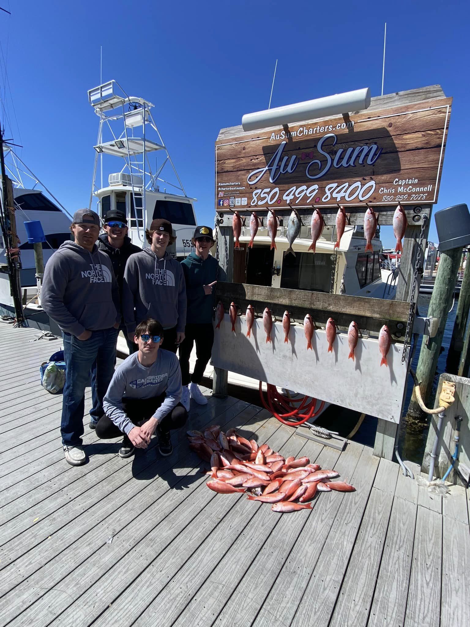 Group of 6 people enjoying fishing in Destin