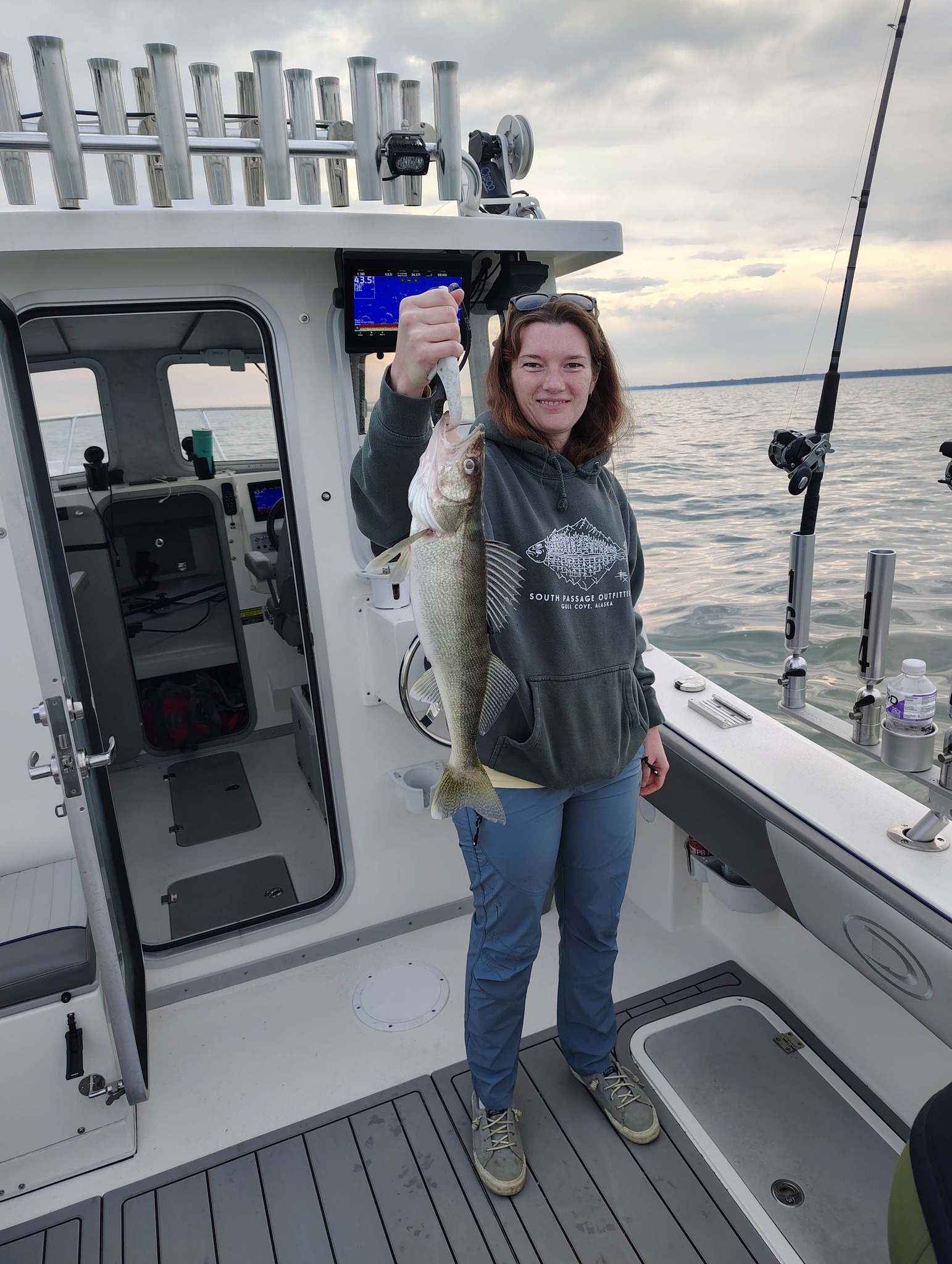 Successful walleye fishing trip on Lake Erie near Geneva-on-the-Lake OH showing caught fish on charter boat