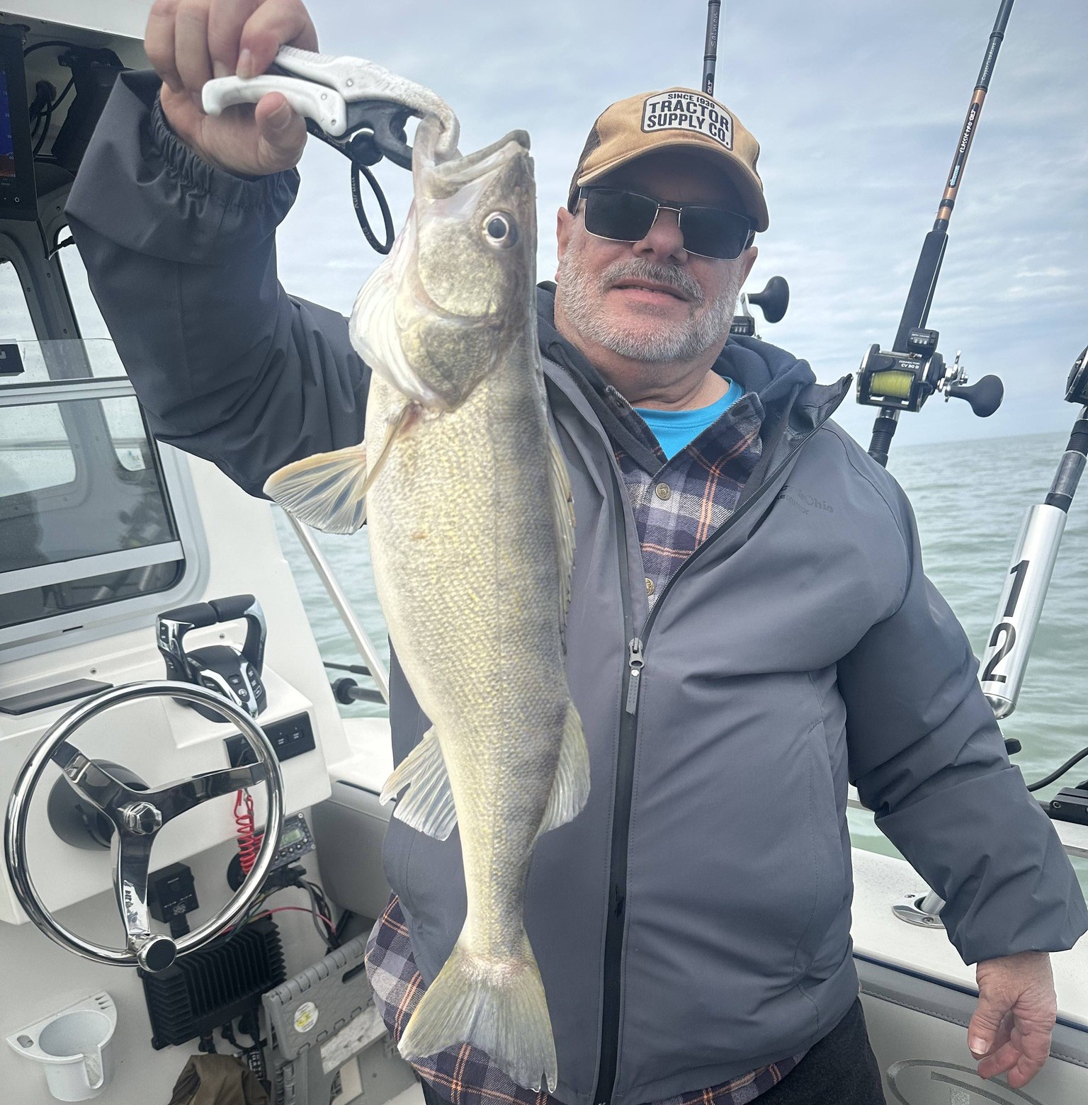 Capt. Mike's 29' Defiance fishing boat on Lake Erie for private walleye fishing trips from Geneva Ohio