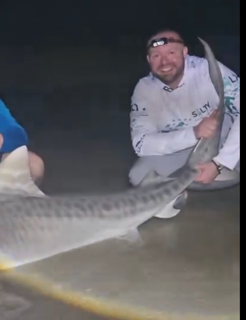 A person fishing at New Smyrna Beach