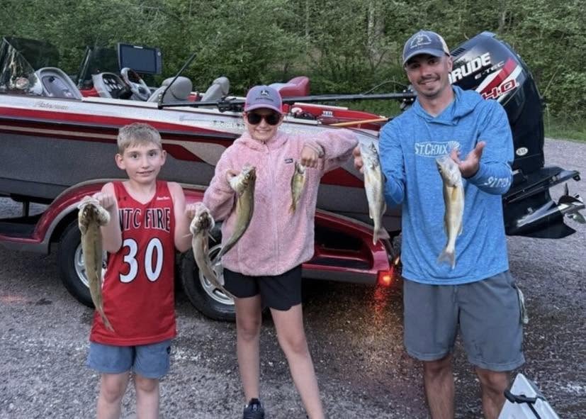 Successful walleye fishing trip in Minocqua Wisconsin showing multiple caught fish