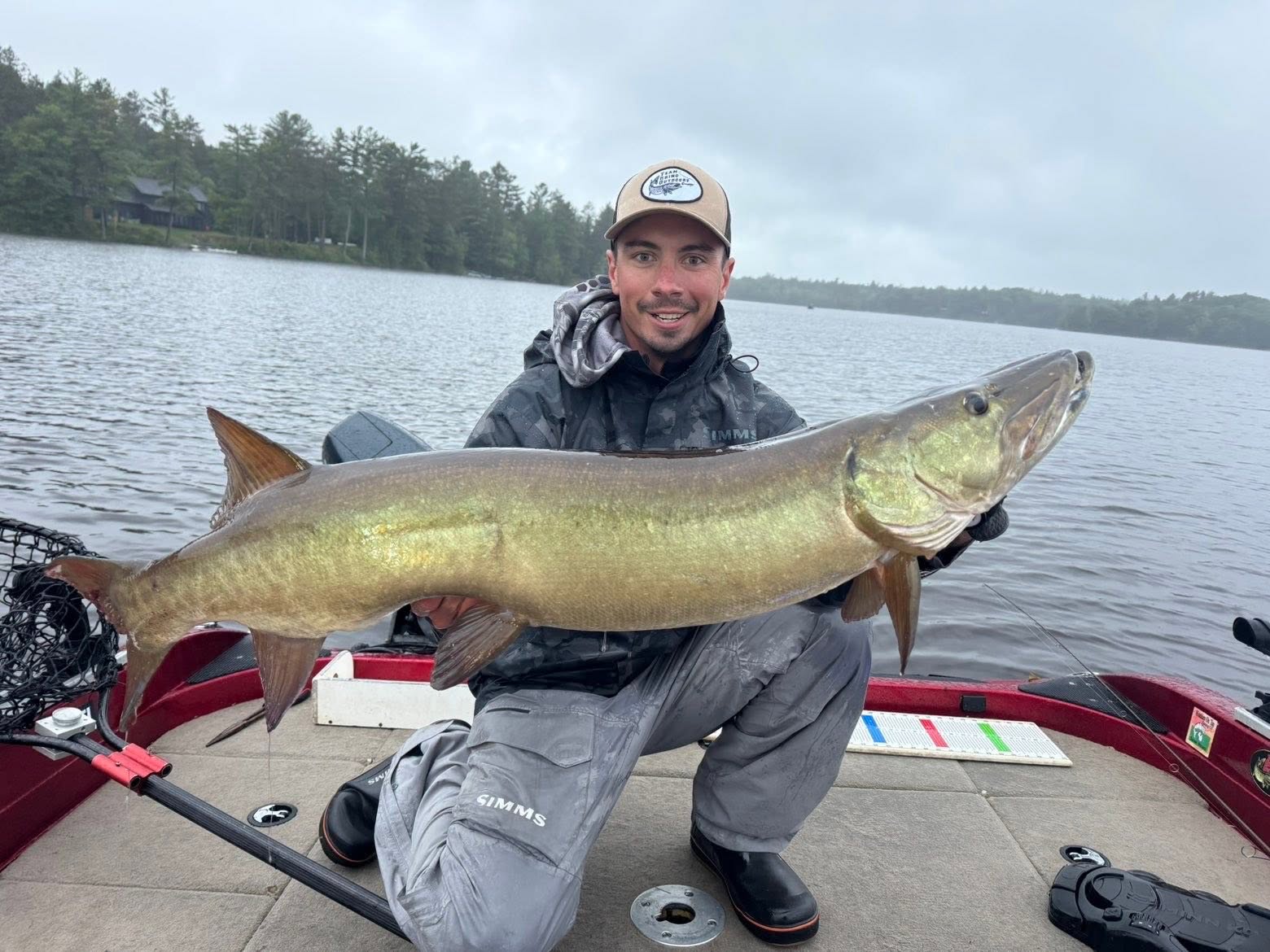 Large muskellunge fish caught in Minocqua Wisconsin displayed on fishing boat