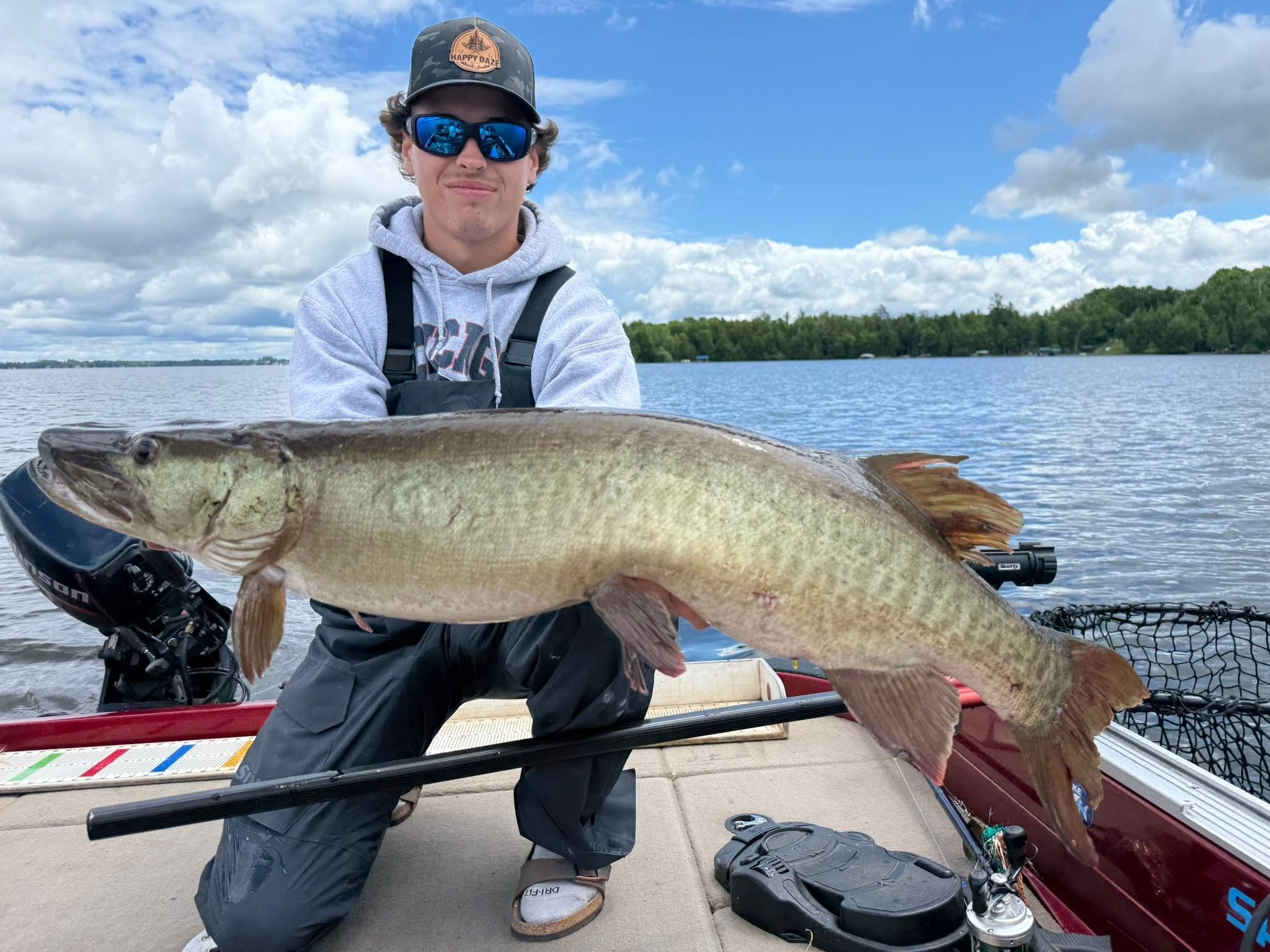 Large muskellunge caught fishing in Minocqua Wisconsin displayed on boat deck