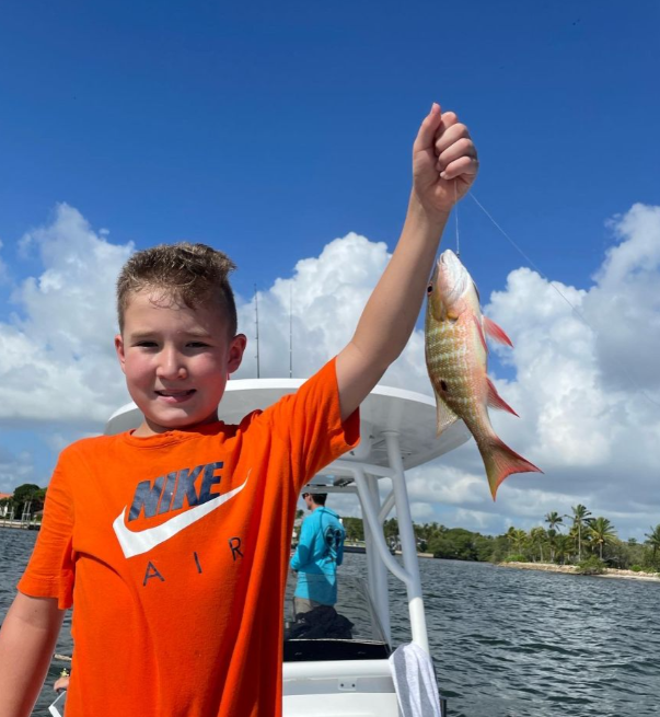 Angler with fishing rod at Jensen Beach