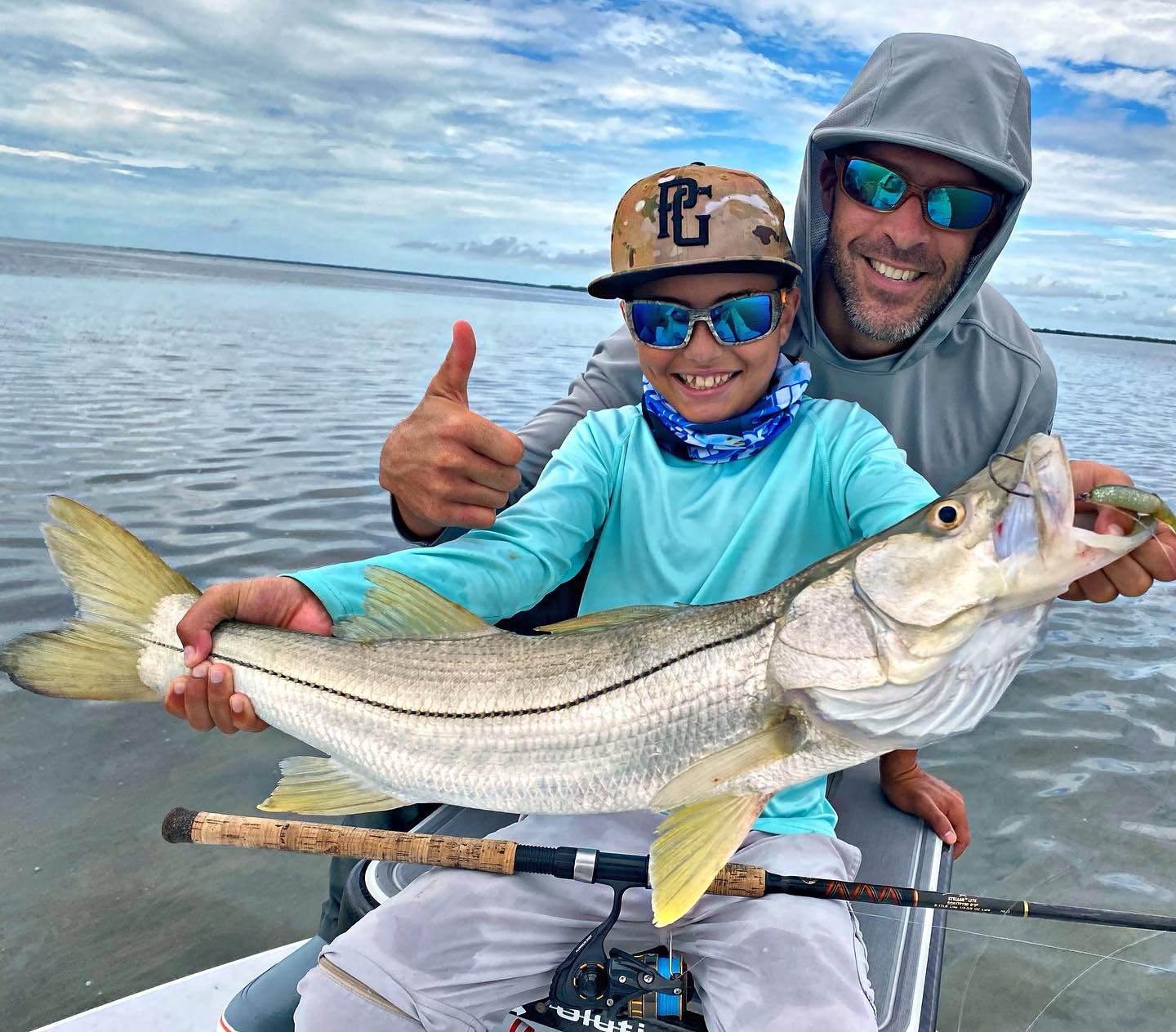 Two people fishing for a snook in Homestead