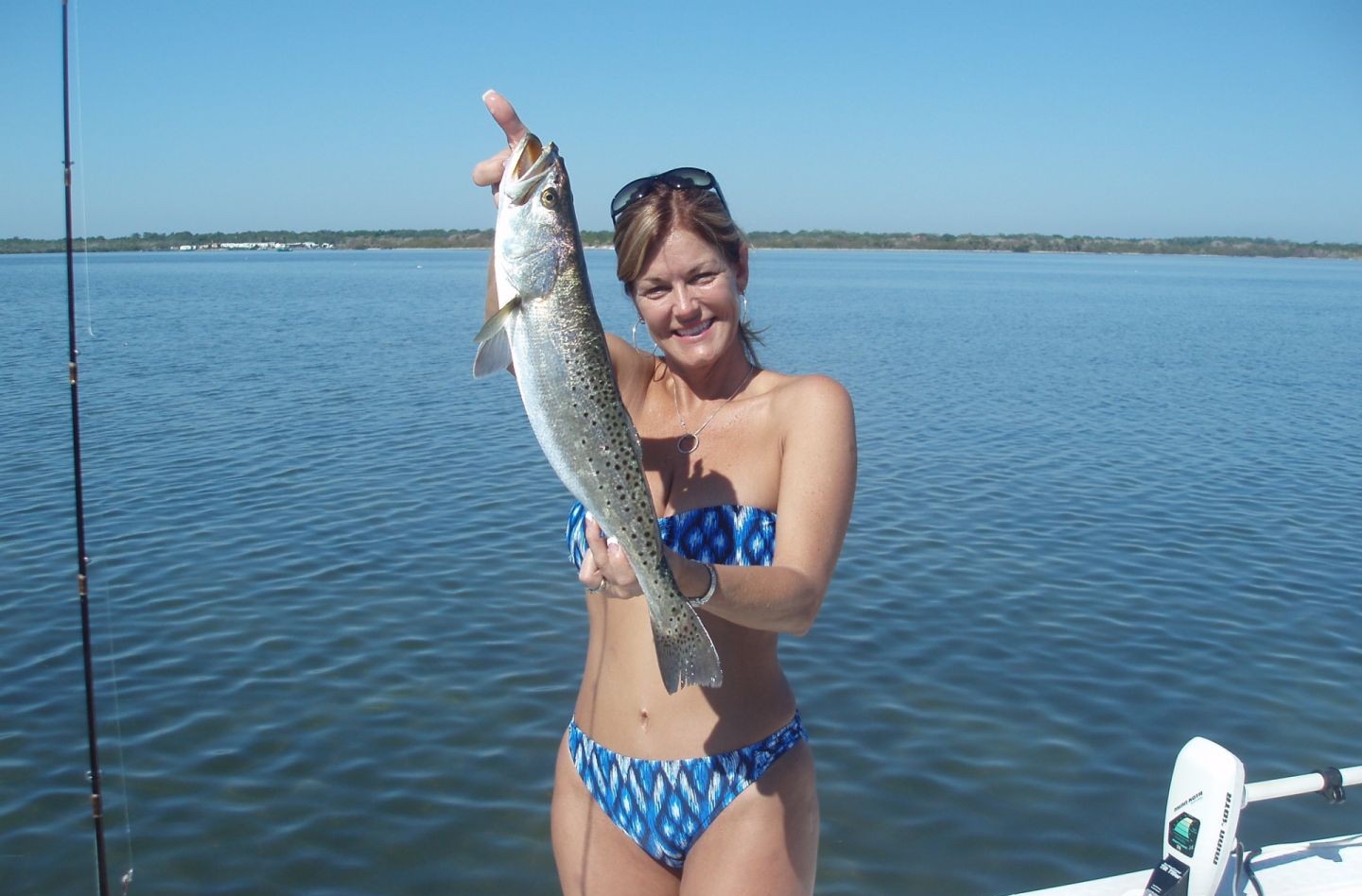Angler with a sea trout fish in Oak Hill