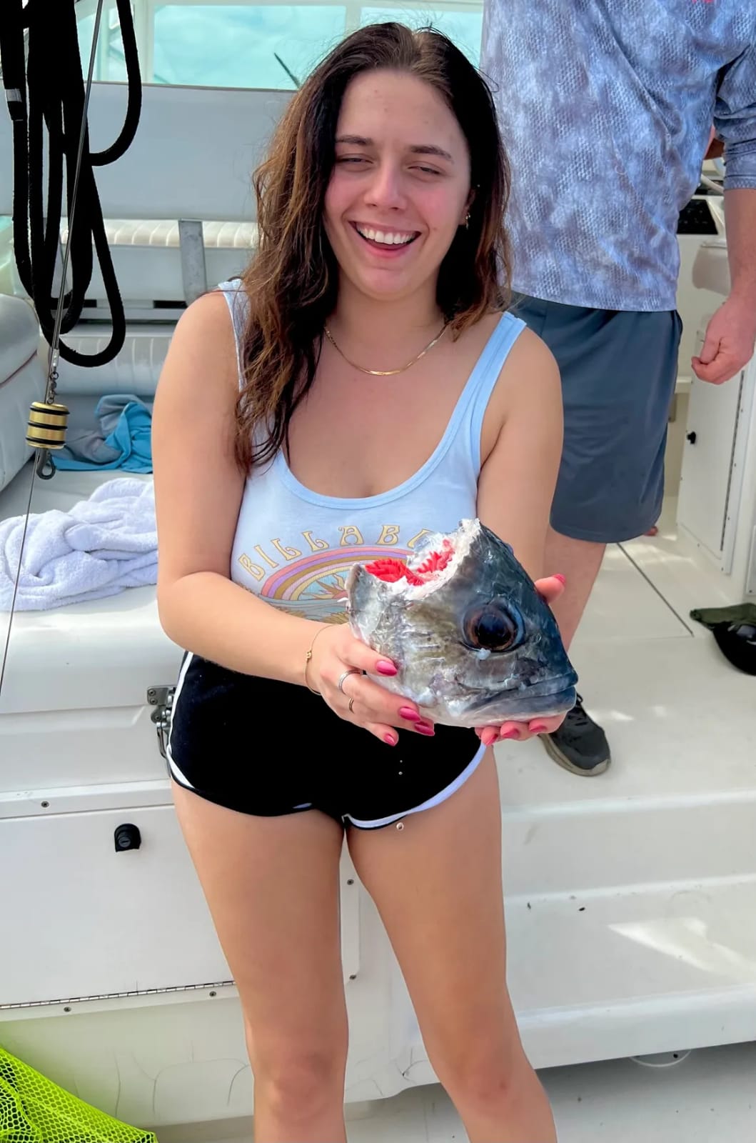Angler holding a fish in Fajardo