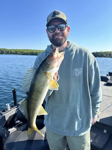 Freshly caught walleye held on boat in Traverse City Michigan waters