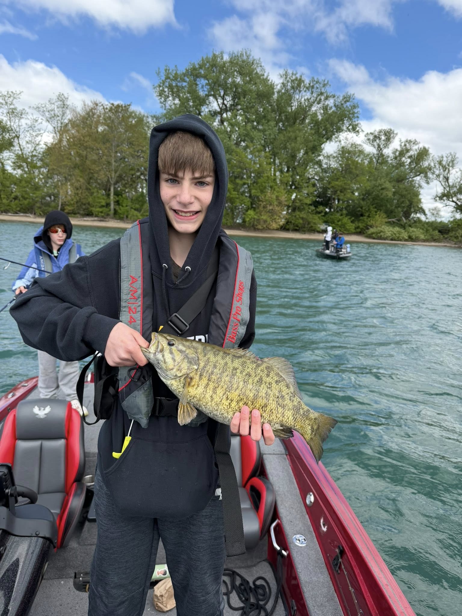 Smallmouth bass catch during fishing trip on boat in North Tonawanda NY