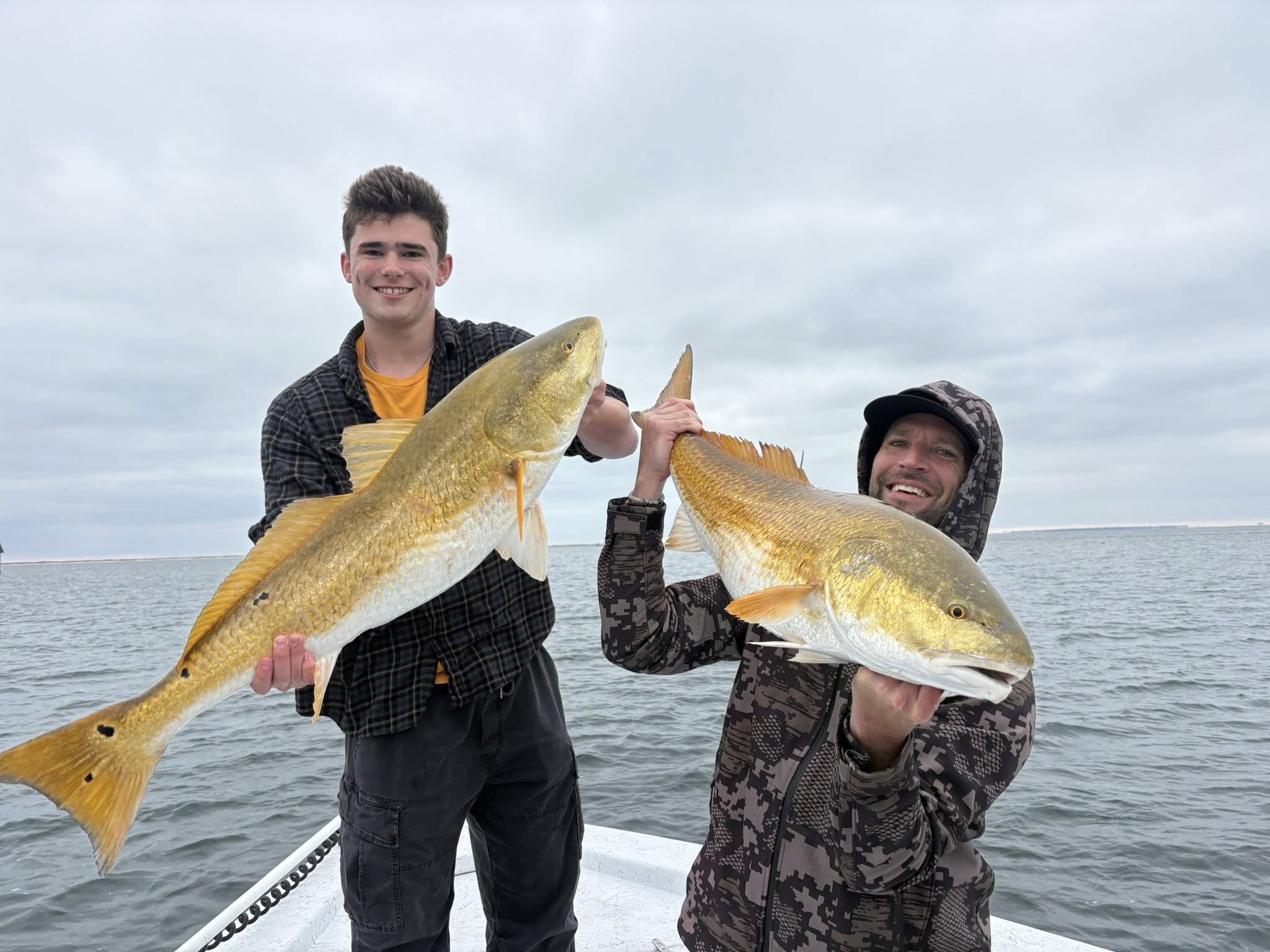 Two large redfish caught on a fishing boat in Pensacola FL waters