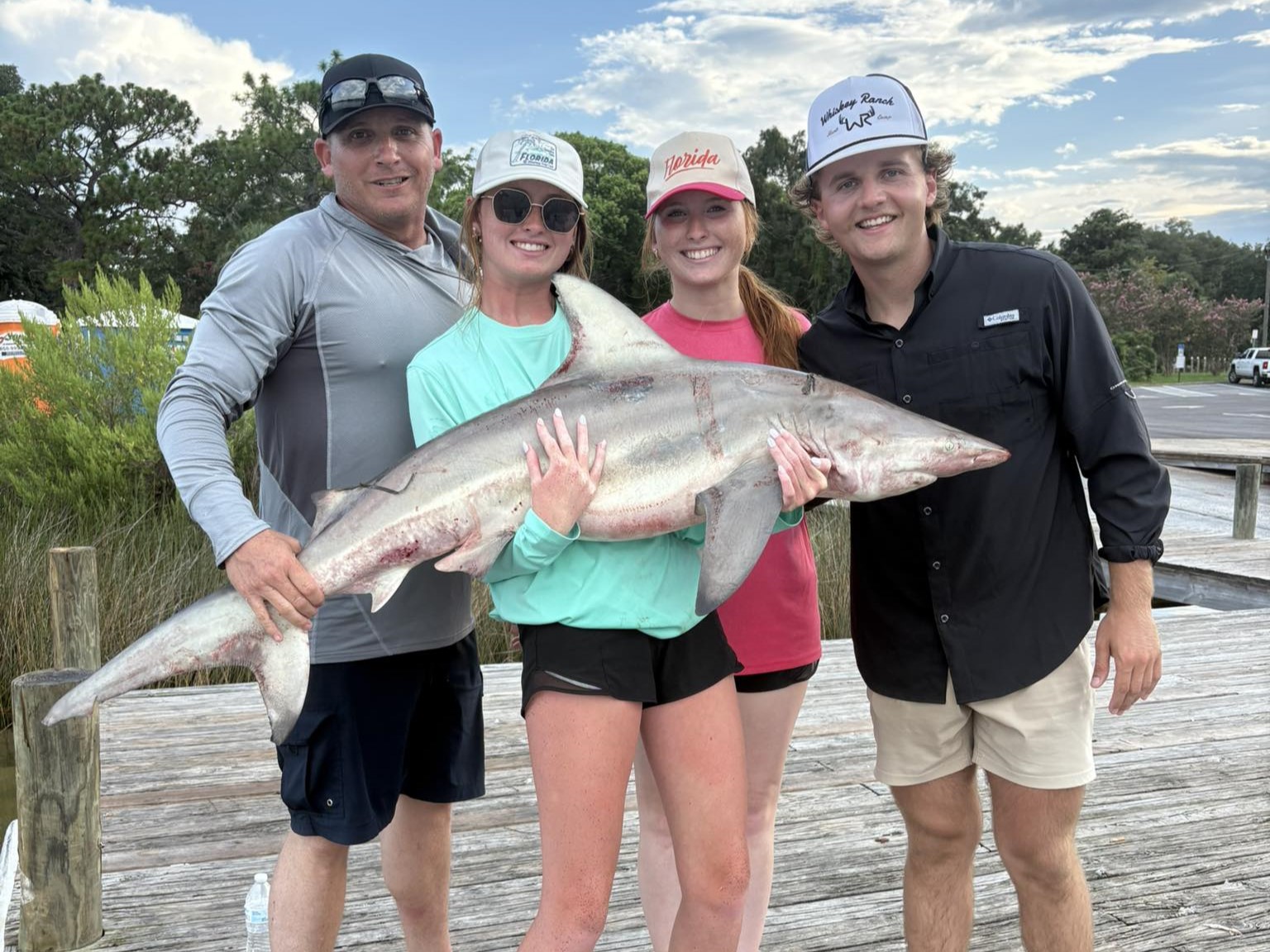 Pensacola shark fishing charter boat with heavy tackle gear for 4-hour inshore trips