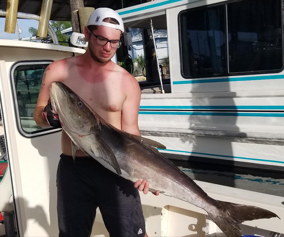 A person fishing in FL