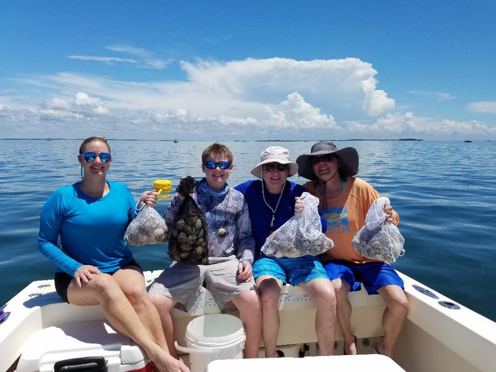 4 people enjoying fishing in Homosassa