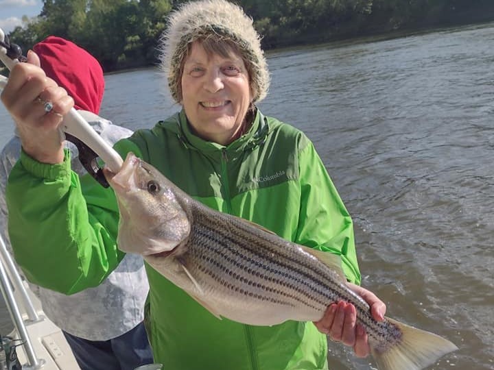 Captain Joey's 24-foot Carolina Skiff ready for half-day striped bass fishing on Weldon, NC river
