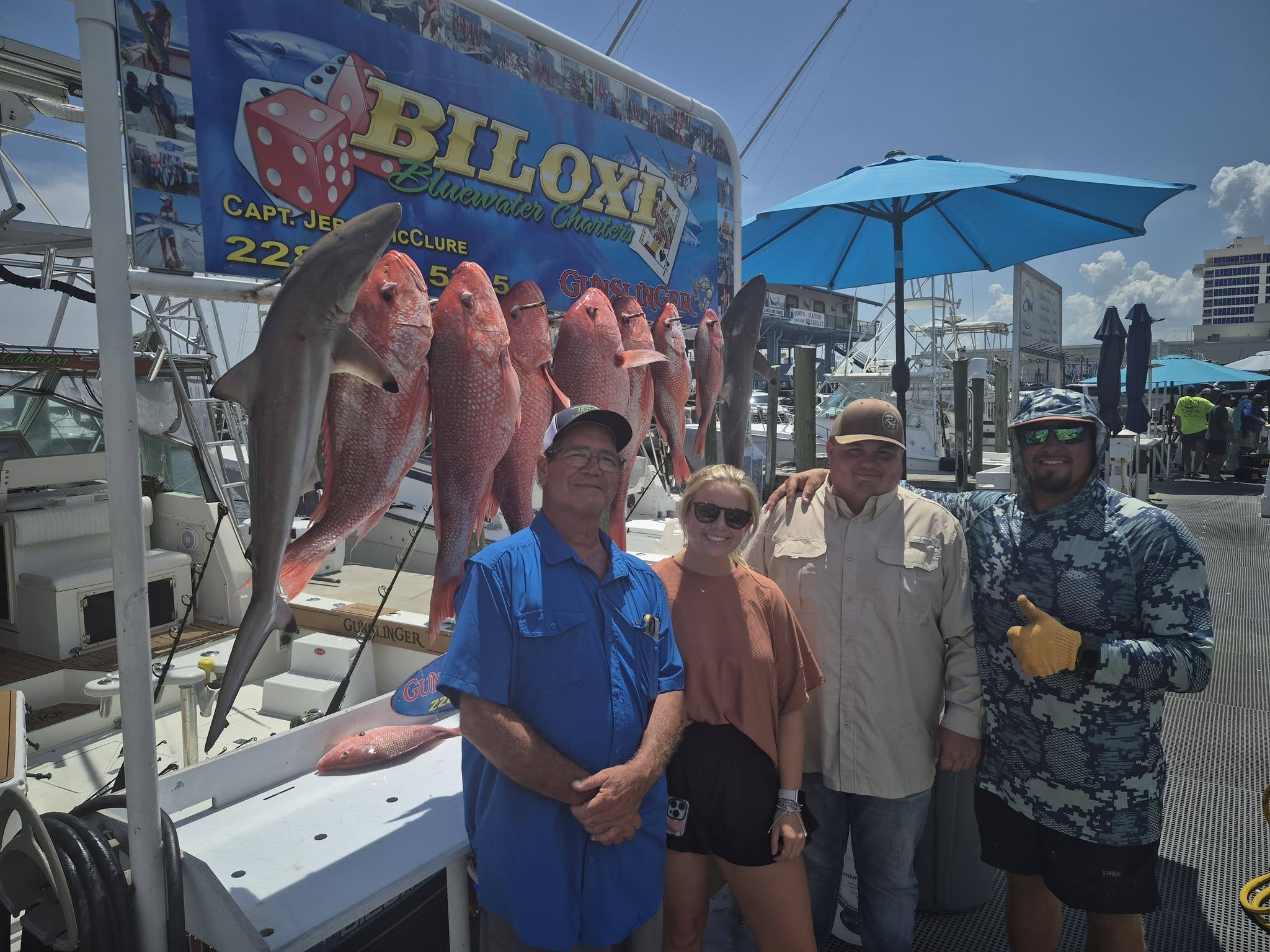 Red snapper and blacktip shark fishing catch displayed on charter boat in Biloxi MS