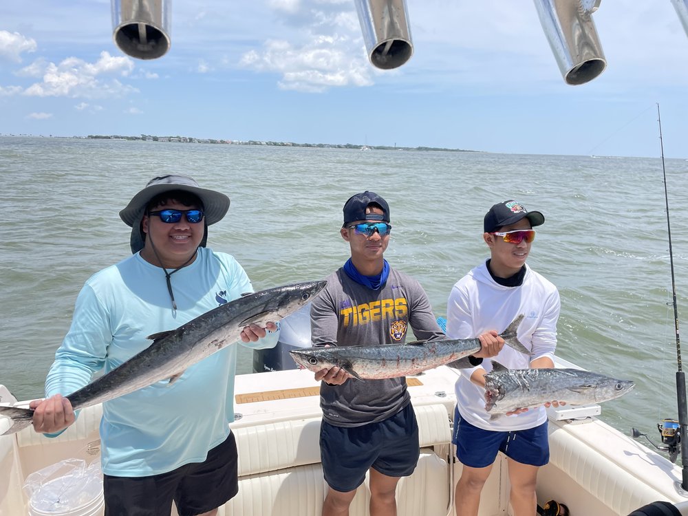 Three king mackerel and great barracuda fish caught in North Charleston