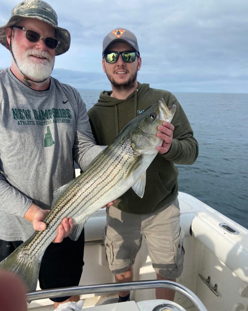 Striped bass caught by two people in Dennis