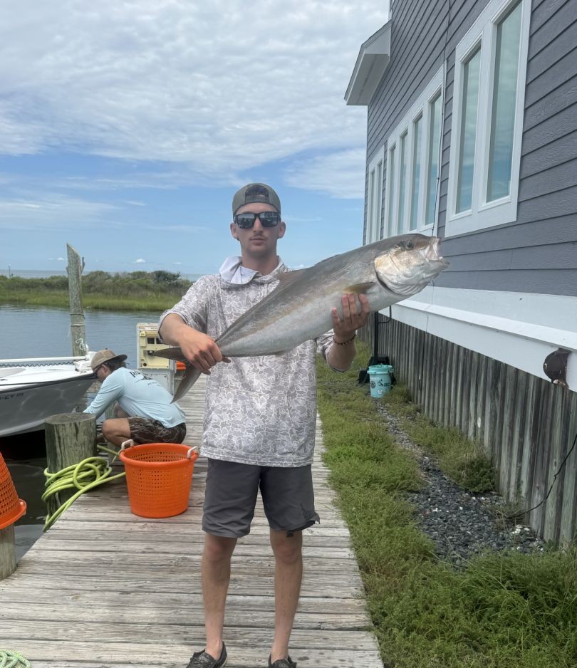Angler with a fishing rod in the great outdoors in NC