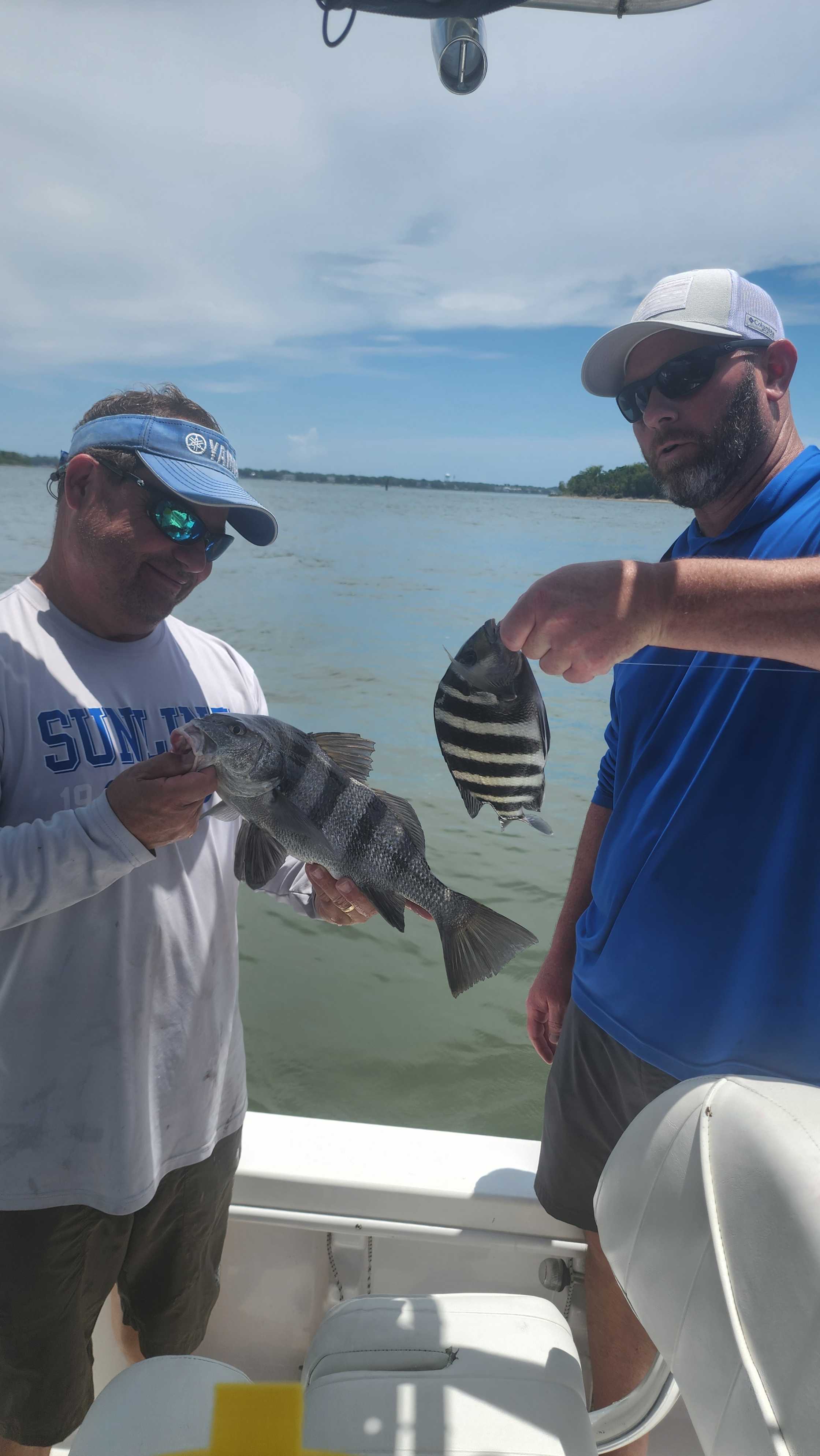 A person fishing for a black drum in South Carolina