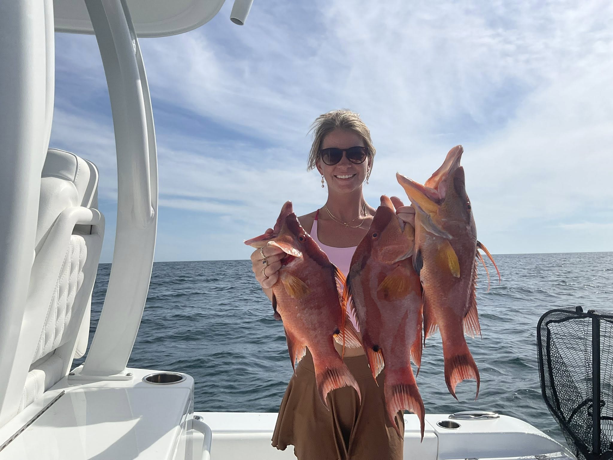 Three fishing rods on the shore of Belleair Bluffs