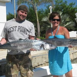 Two anglers fishing on a sunny day in Florida
