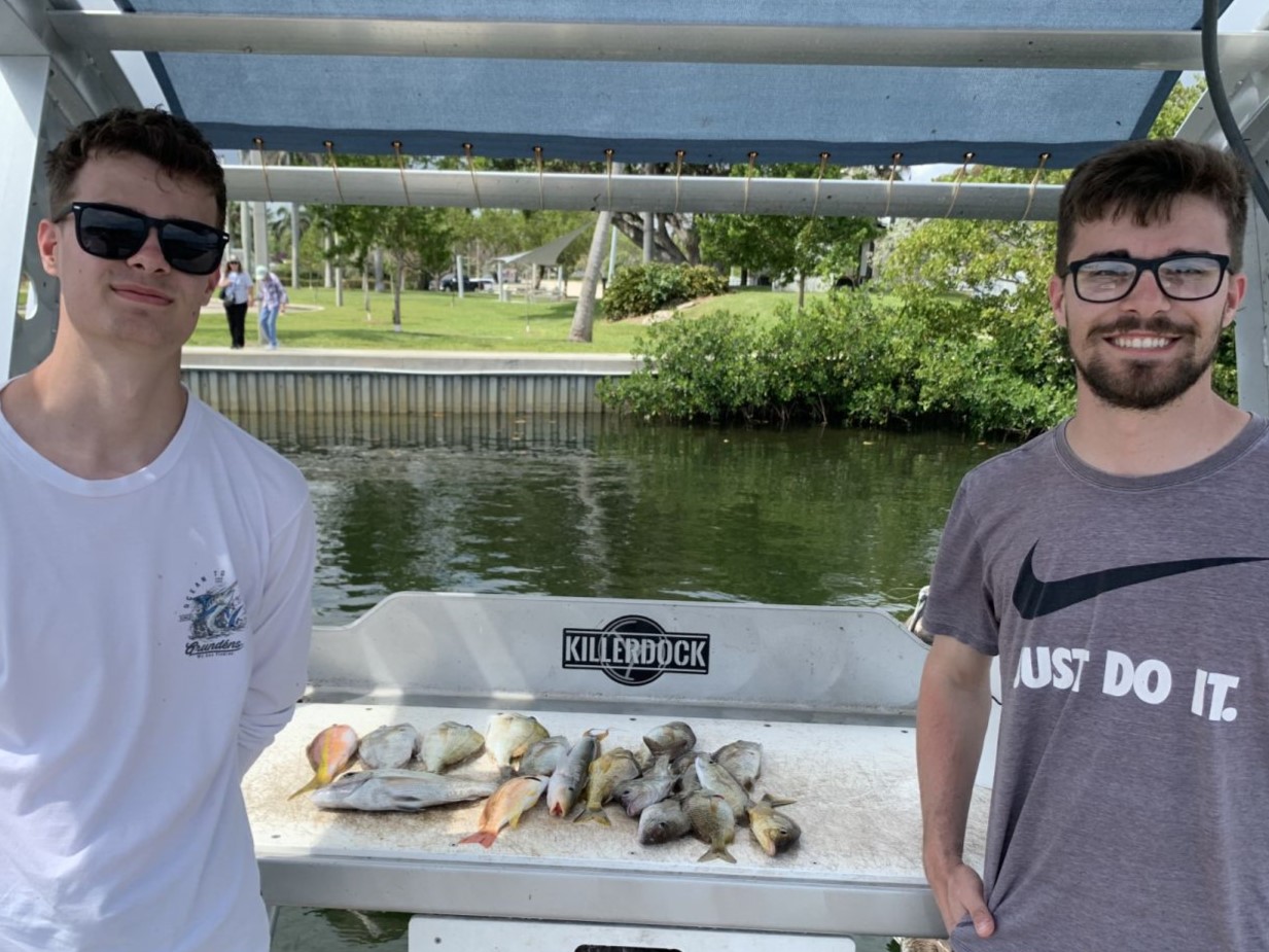 Two people enjoying a fishing and hunting adventure in FL