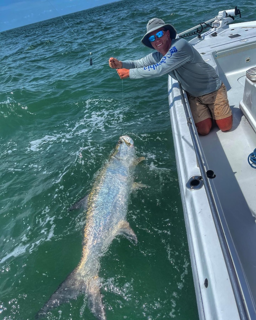 Angler holding a fish caught at Fernandina Beach