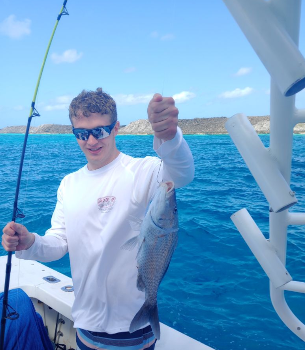 A single angler fishing in the waters of Nassau