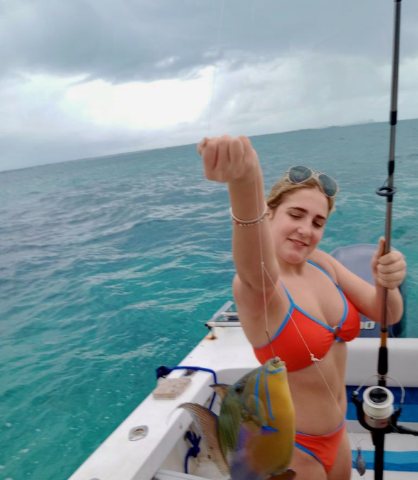 A lone angler fishing in the picturesque waters of Nassau