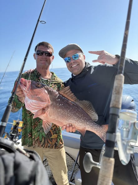 Red grouper catch displayed on fishing charter boat in Matlacha FL waters