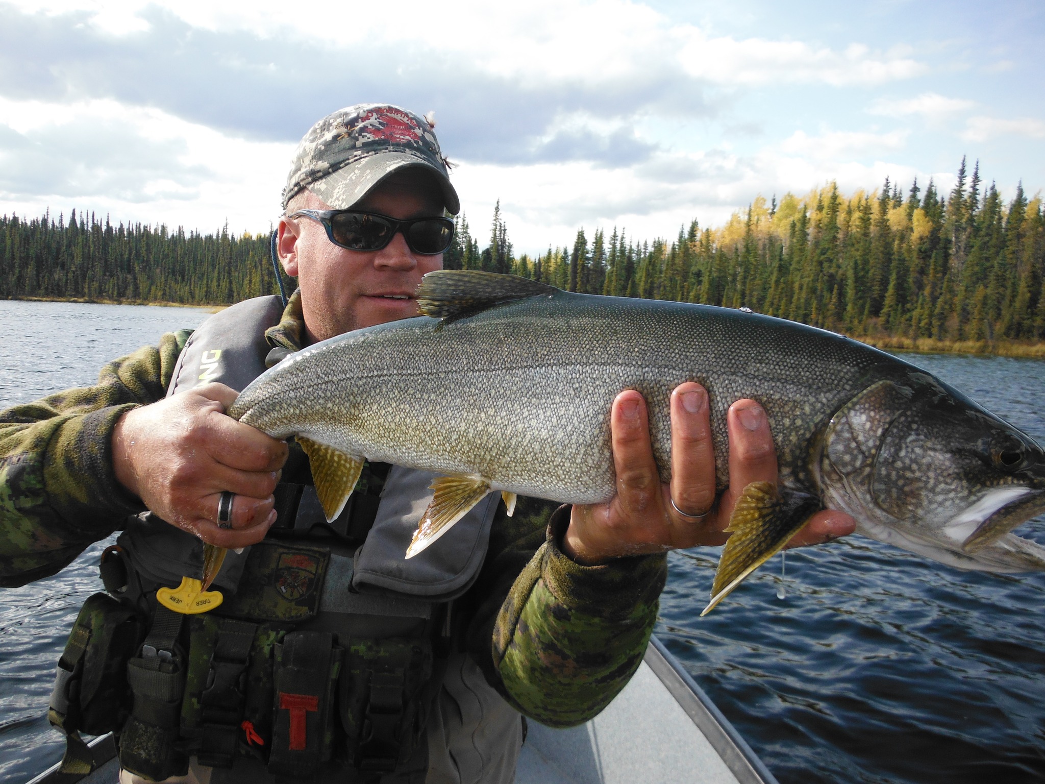Angler posing with a big catch in YT