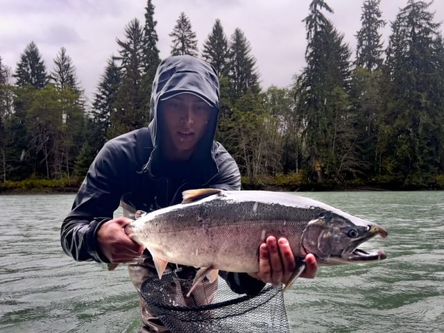Angler with a 22-inch fish in YT