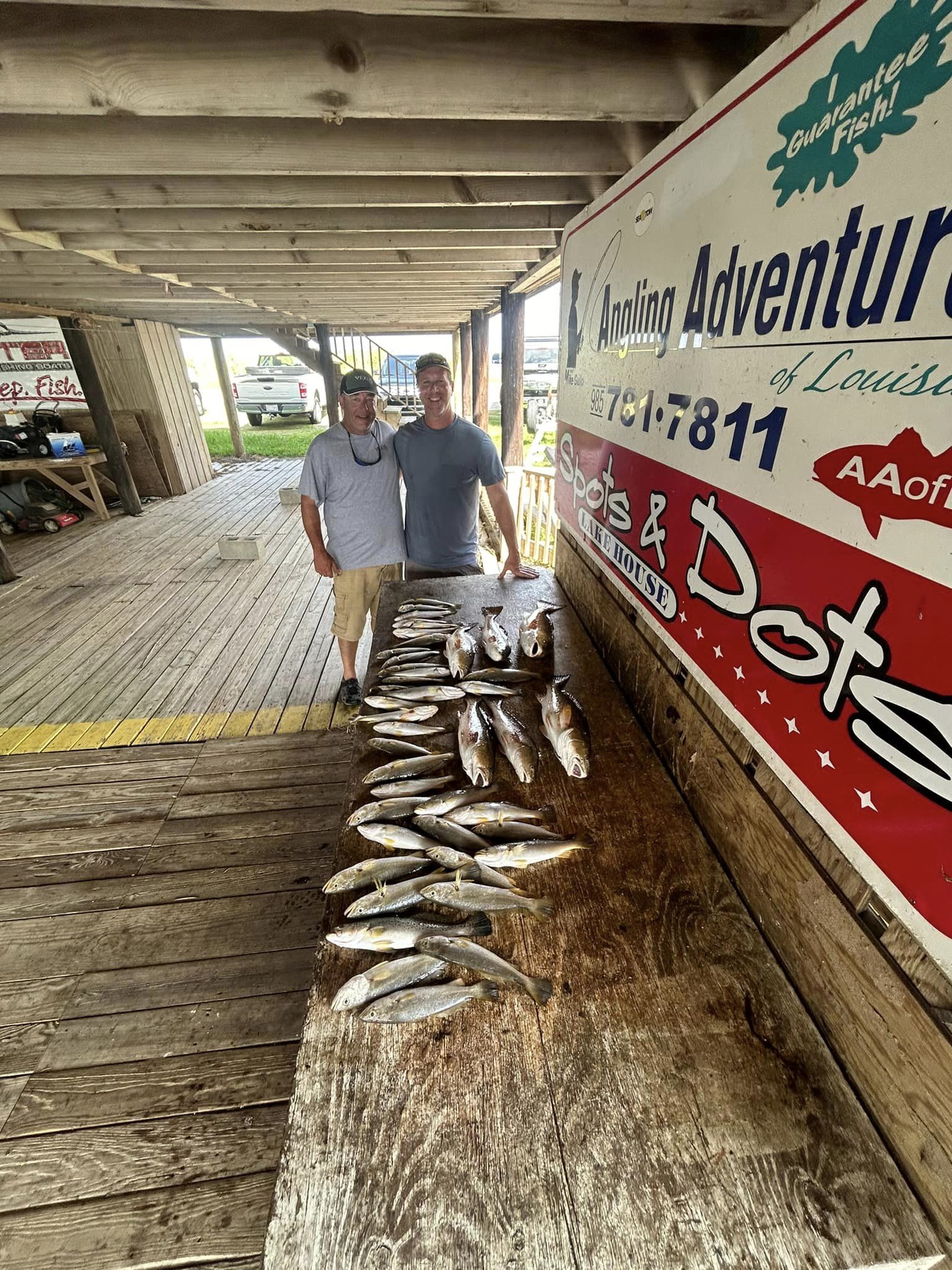 Two people fishing in Slidell