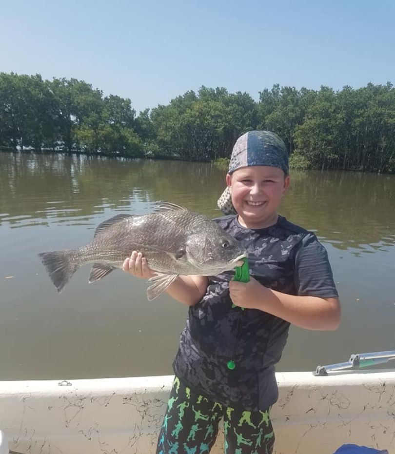 Black drum catch displayed on fishing boat in Cedar Key FL waters