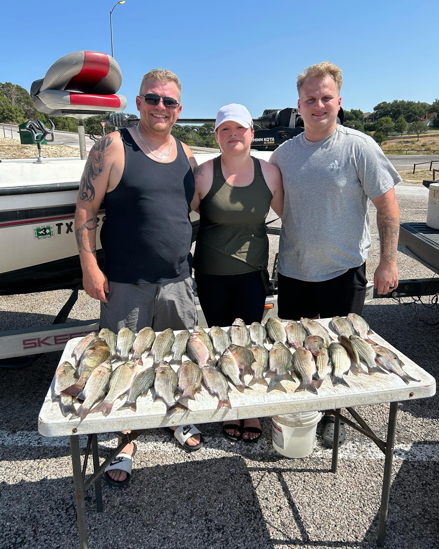 Three people fishing in Belton