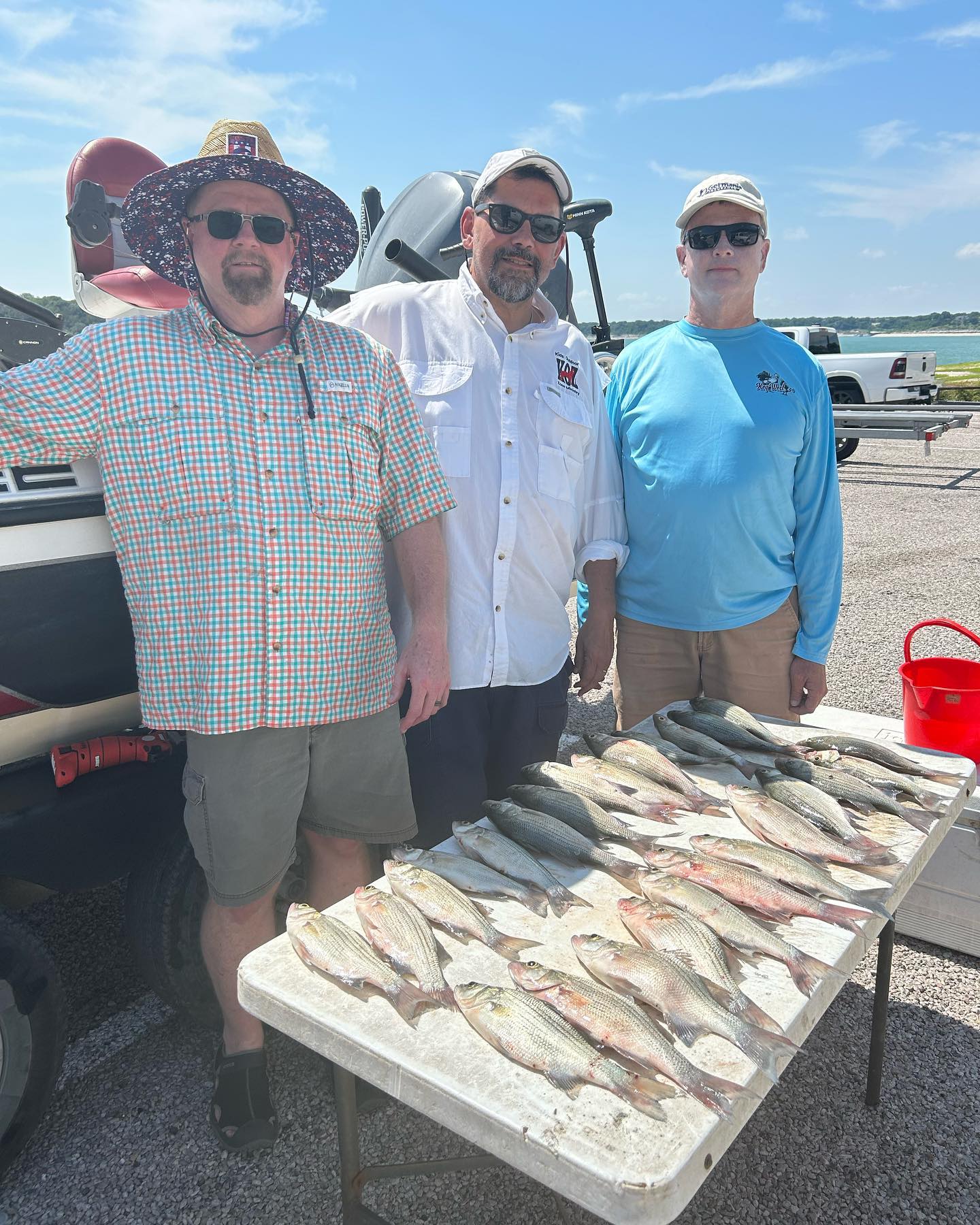 Three people fishing in TX