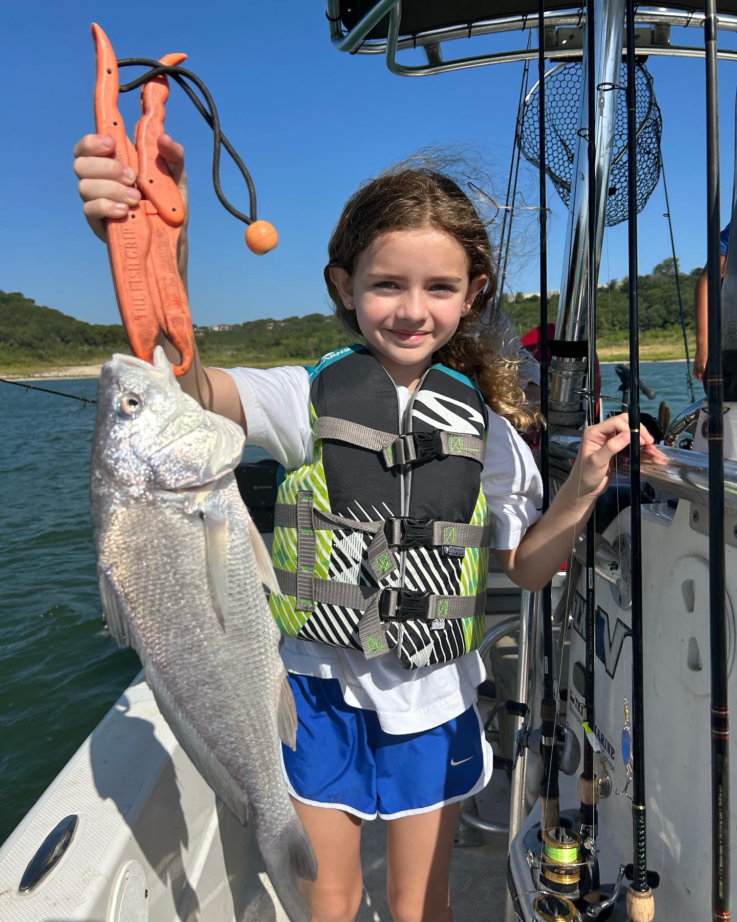 A person holding a 23-inch fish in Belton