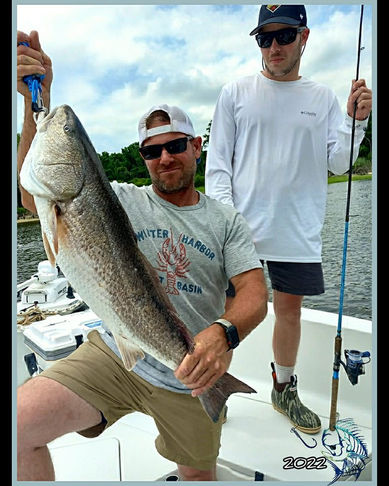 Two fishermen enjoying a fishing trip in Calabash